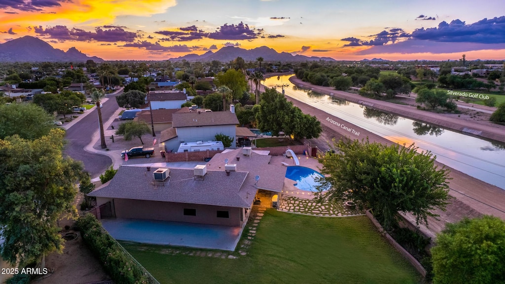 aerial view at dusk with a mountain view