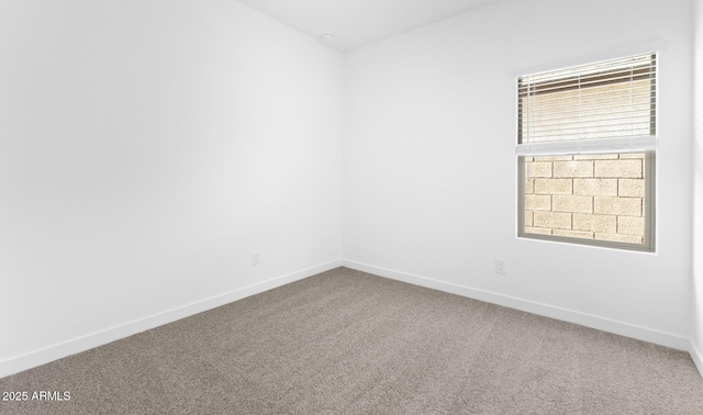 spare room with carpet floors and a healthy amount of sunlight