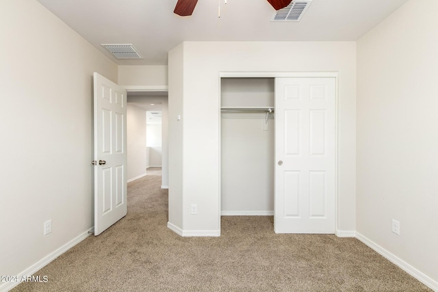 915 E Agua Fria Ln, Avondale, AZ 85323 - unfurnished bedroom featuring a closet, baseboards, visible vents, and carpet