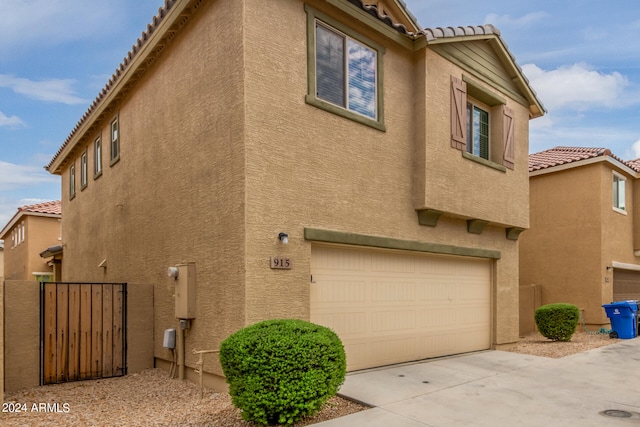 exterior space featuring a garage