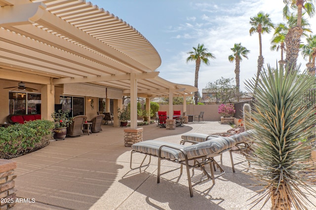 view of patio / terrace with outdoor dining space, fence, and a pergola