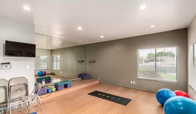 3500 N Hayden Rd Unit 801, Scottsdale, AZ 85251 - workout area featuring wood finished floors, recessed lighting, and healthy amount of natural light