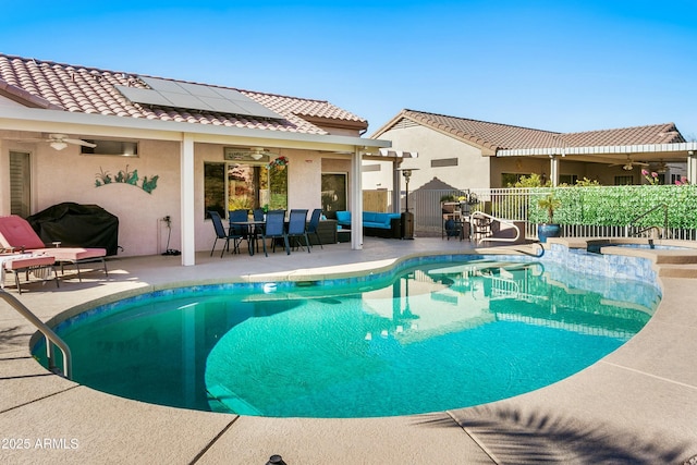 view of swimming pool with a patio area, an outdoor living space, and area for grilling