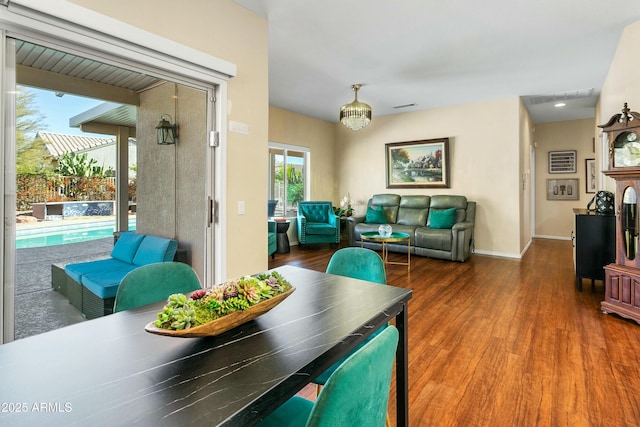 dining room featuring hardwood / wood-style flooring