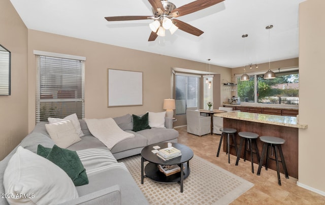 living room with ceiling fan