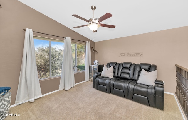 living room with lofted ceiling, light colored carpet, and ceiling fan