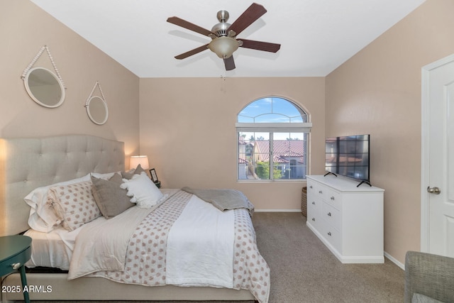 bedroom with ceiling fan and light colored carpet