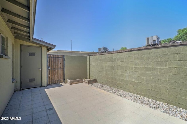 1850 E Maryland Ave Unit 63, Phoenix, AZ 85016 - view of patio with central AC unit