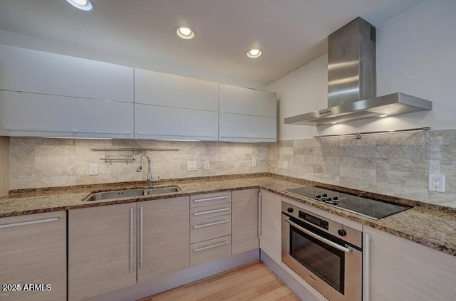 1850 E Maryland Ave Unit 63, Phoenix, AZ 85016 - kitchen featuring stainless steel oven, wall chimney exhaust hood, black electric cooktop, a sink, and modern cabinets