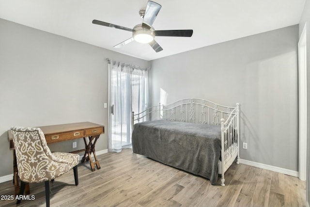 bedroom featuring ceiling fan and light wood-type flooring