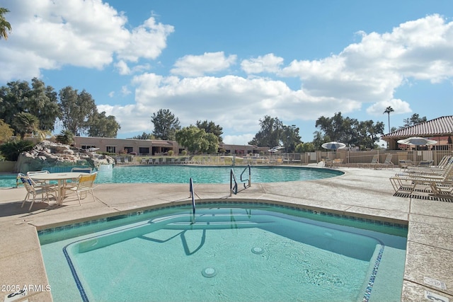 view of pool featuring a patio area