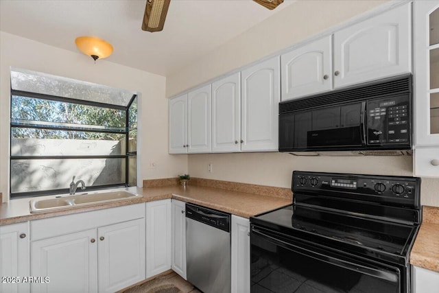 kitchen featuring black appliances, a ceiling fan, a sink, white cabinets, and light countertops