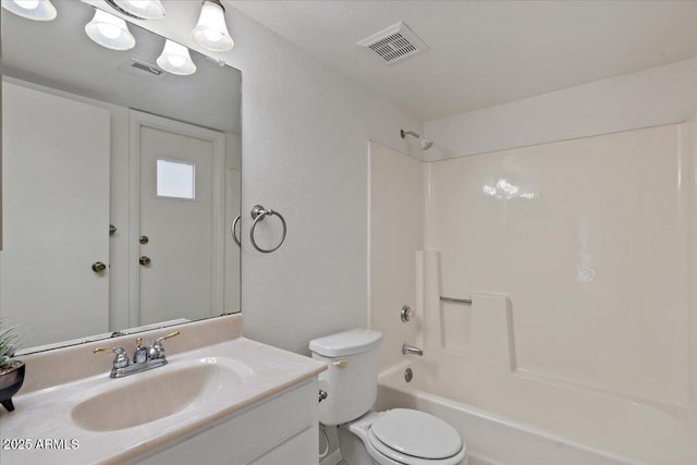 full bath with visible vents, toilet, vanity, and shower / bathing tub combination