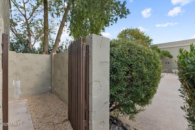 exterior space with a gate and fence