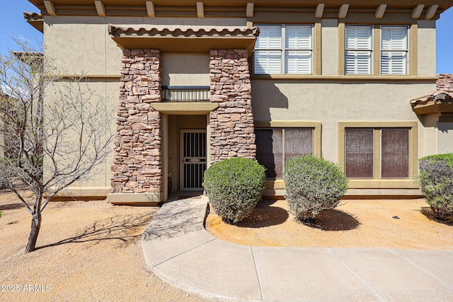19700 N 76th St Unit 1124, Scottsdale, AZ 85255 - view of exterior entry with stucco siding