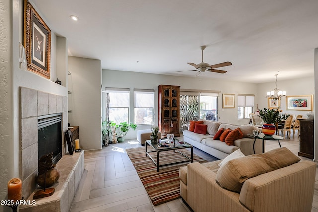 19700 N 76th St Unit 1124, Scottsdale, AZ 85255 - living area featuring ceiling fan with notable chandelier, a fireplace, and recessed lighting
