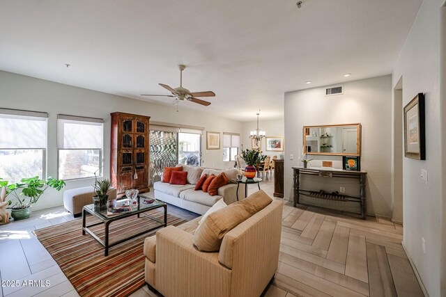 19700 N 76th St Unit 1124, Scottsdale, AZ 85255 - living area with recessed lighting, ceiling fan with notable chandelier, and visible vents