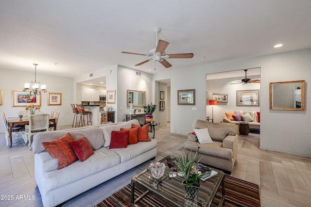 19700 N 76th St Unit 1124, Scottsdale, AZ 85255 - living room featuring ceiling fan with notable chandelier and recessed lighting