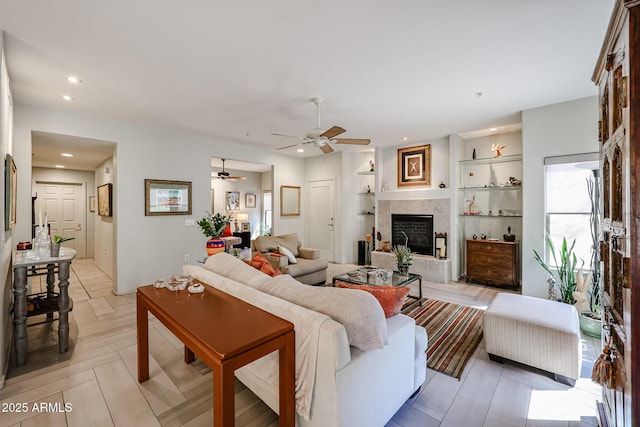 19700 N 76th St Unit 1124, Scottsdale, AZ 85255 - living area featuring a ceiling fan, a fireplace, and recessed lighting