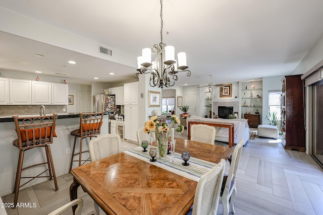19700 N 76th St Unit 1124, Scottsdale, AZ 85255 - dining area with recessed lighting, ceiling fan with notable chandelier, a healthy amount of sunlight, and visible vents