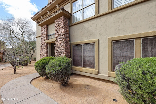 19700 N 76th St Unit 1124, Scottsdale, AZ 85255 - doorway to property with stucco siding