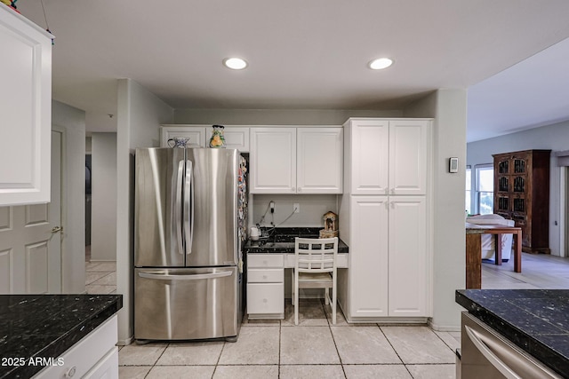 19700 N 76th St Unit 1124, Scottsdale, AZ 85255 - kitchen featuring recessed lighting, white cabinets, light tile patterned floors, and freestanding refrigerator