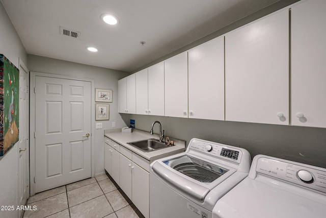 19700 N 76th St Unit 1124, Scottsdale, AZ 85255 - laundry room featuring visible vents, a sink, washer and dryer, cabinet space, and light tile patterned floors