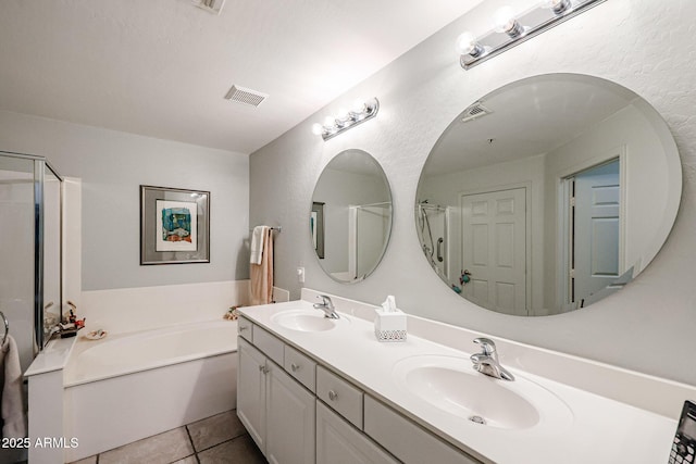 19700 N 76th St Unit 1124, Scottsdale, AZ 85255 - full bathroom featuring visible vents, tile patterned flooring, a sink, and a garden tub