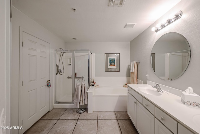 19700 N 76th St Unit 1124, Scottsdale, AZ 85255 - bathroom featuring a stall shower, visible vents, and tile patterned flooring