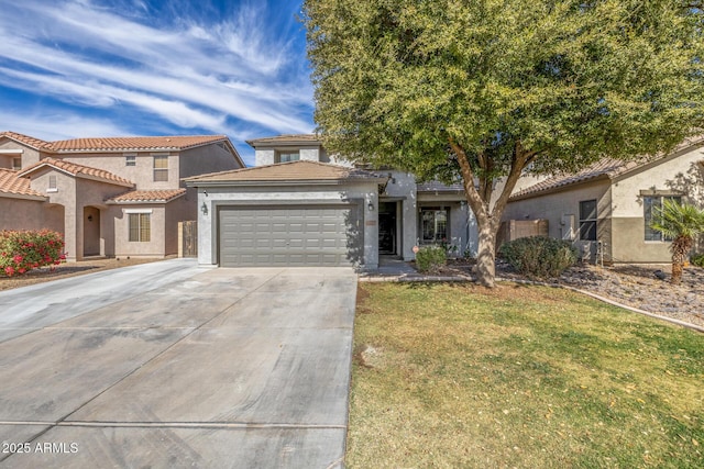 view of front of home with a garage and a front yard