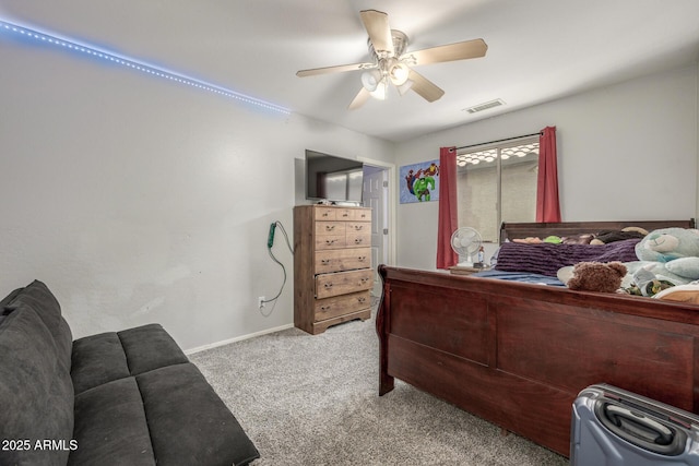 bedroom featuring light carpet and ceiling fan