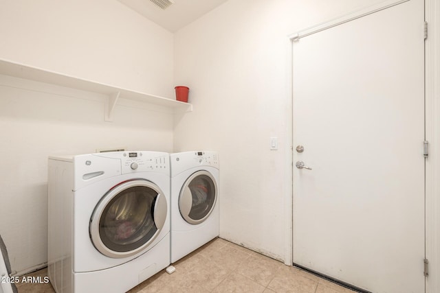 washroom featuring separate washer and dryer