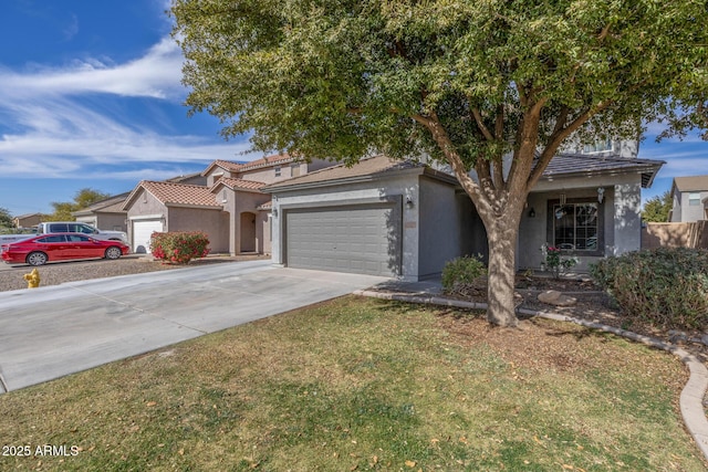 view of front of property with a garage and a front lawn