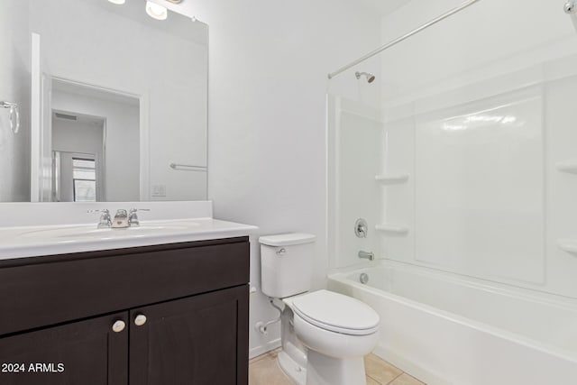 full bathroom featuring shower / washtub combination, tile patterned flooring, vanity, and toilet