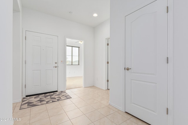 foyer with light tile patterned flooring