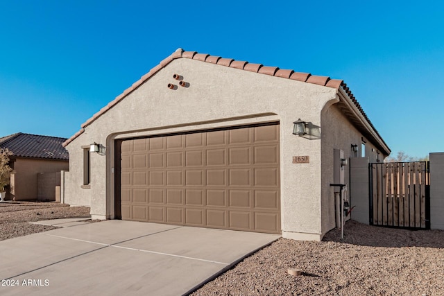 view of property exterior featuring a garage