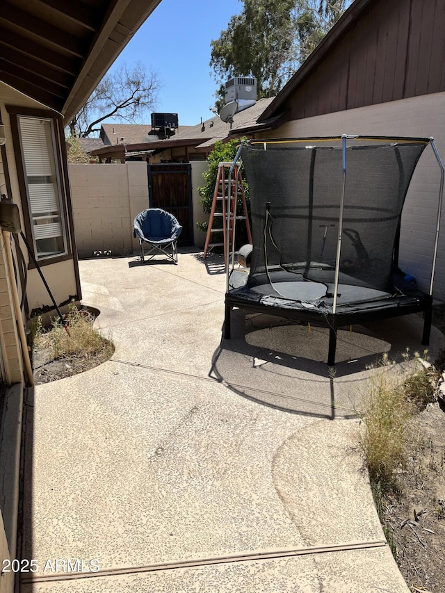 view of patio / terrace with fence