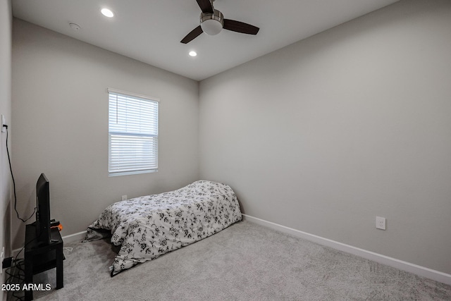 carpeted bedroom featuring ceiling fan