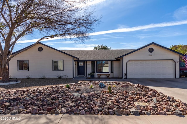 ranch-style house featuring a garage