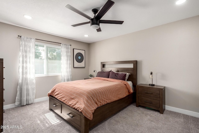 carpeted bedroom featuring ceiling fan