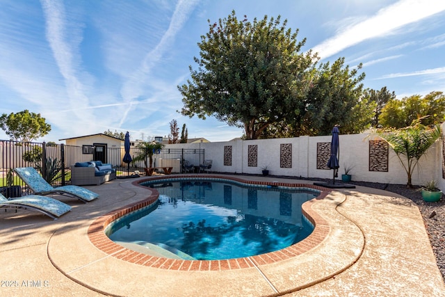 view of pool featuring a patio