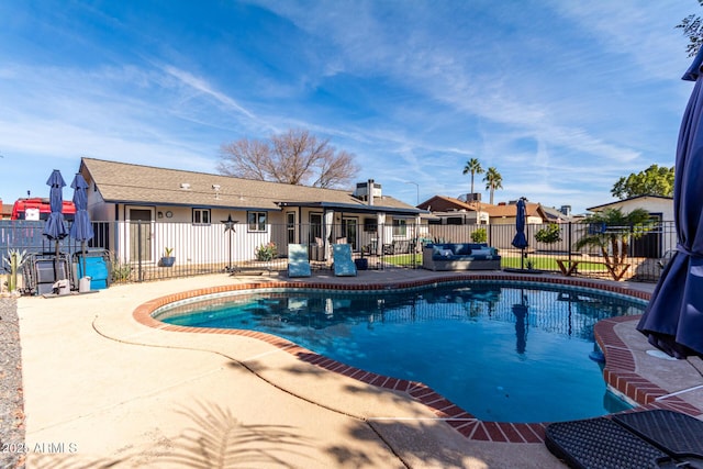 view of swimming pool featuring a patio