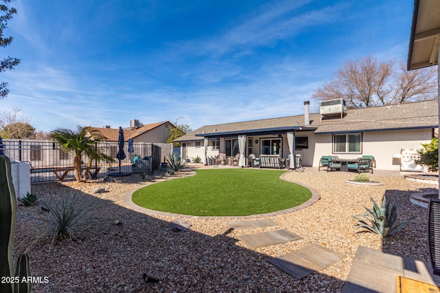 back of property featuring central AC unit, a patio area, and outdoor lounge area