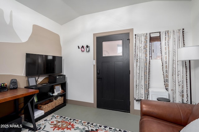 foyer featuring vaulted ceiling