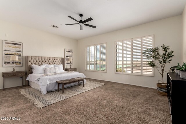 bedroom with visible vents, baseboards, a ceiling fan, and carpet floors