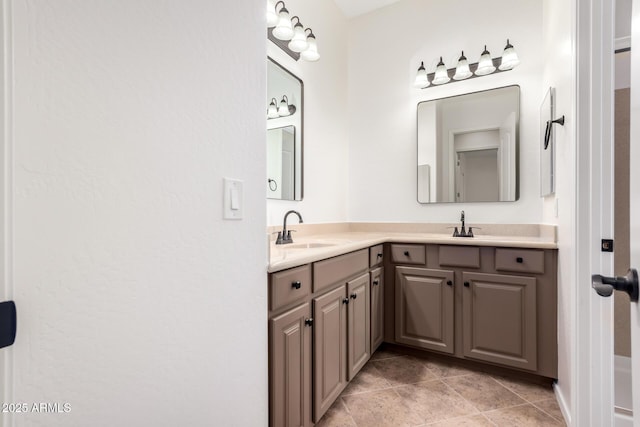 full bath with double vanity and a sink