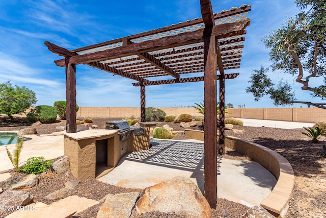 view of patio with a fenced backyard, area for grilling, and a pergola