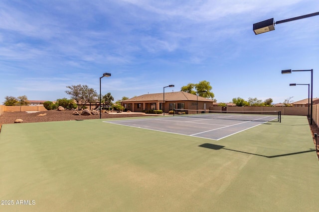 view of sport court with community basketball court and fence