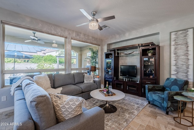 living room featuring ceiling fan