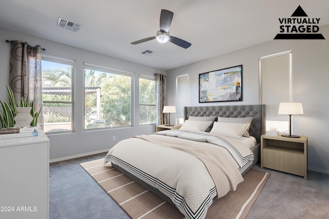 carpeted bedroom featuring ceiling fan